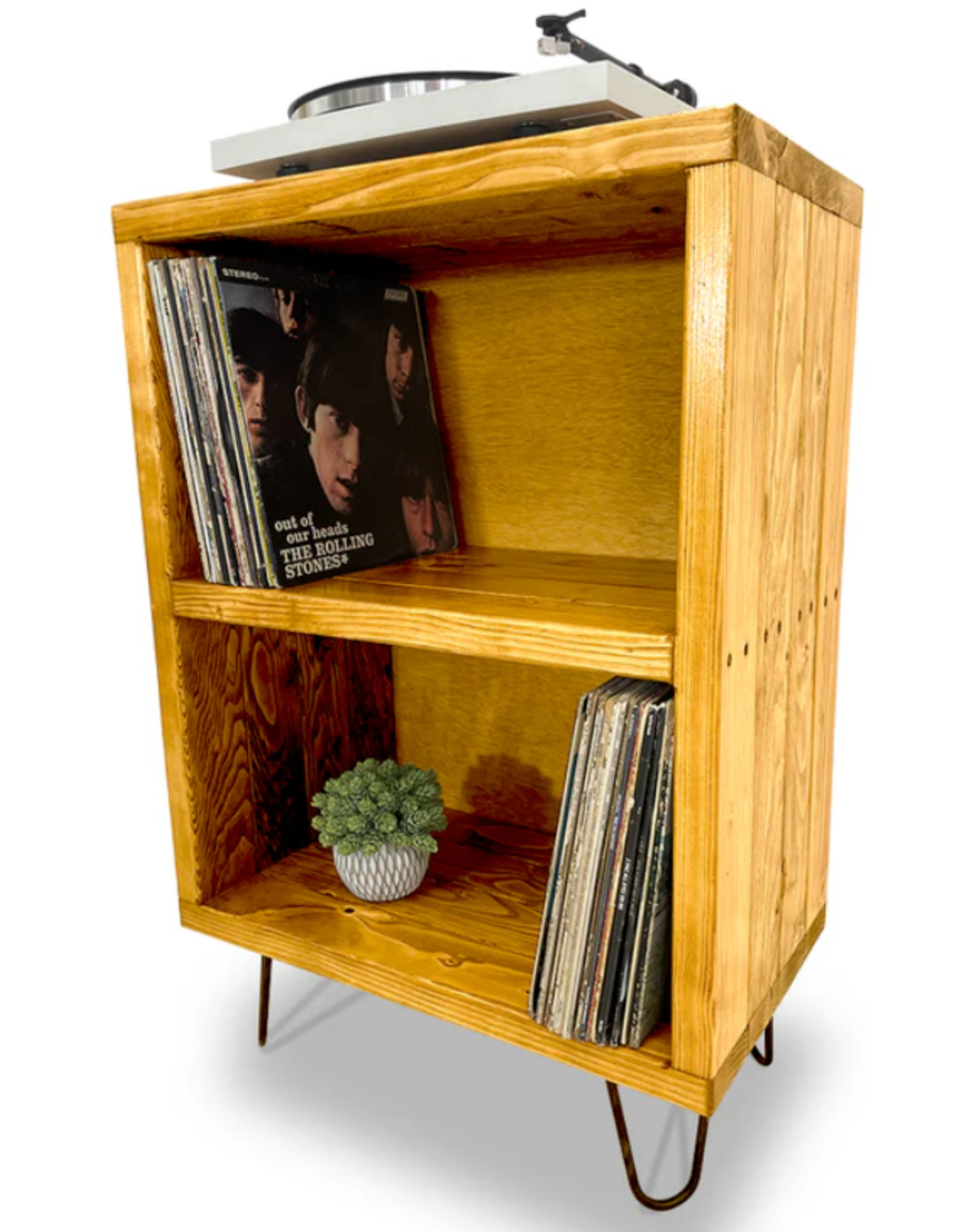 Natural wood trapezoid corner shelf unit with two open compartments for books and decor