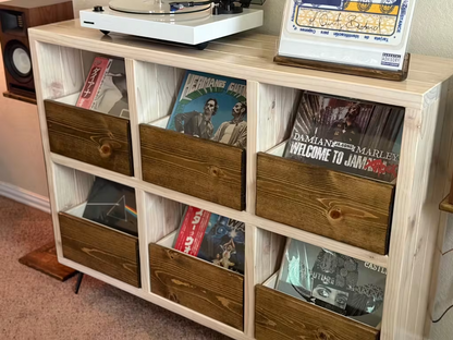 Vinyl record storage cabinet with white frame and six slatted wooden storage drawers