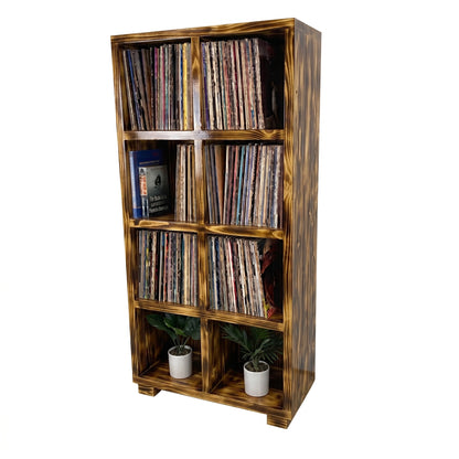 Golden finish vinyl record storage cabinet with open cubbies and stored vinyl records