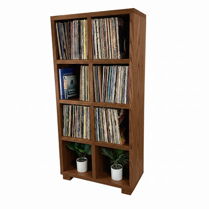 Warm brown vinyl record storage cabinet with open cubbies and stacked vinyl records
