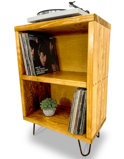 Natural wood trapezoid corner shelf unit with two open compartments for books and decor
