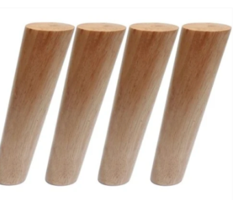 Set of four light wood tapered table legs with smooth cylindrical shape