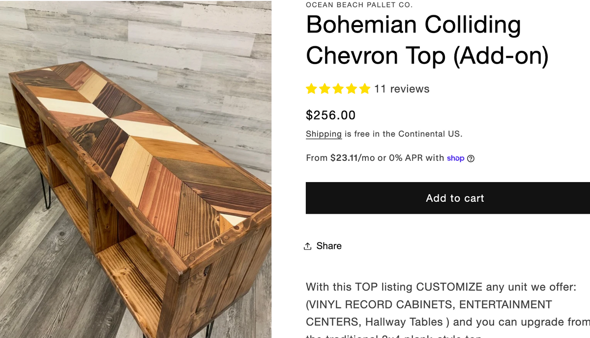 Wood dining table with geometric chevron-pattern top and angled legs