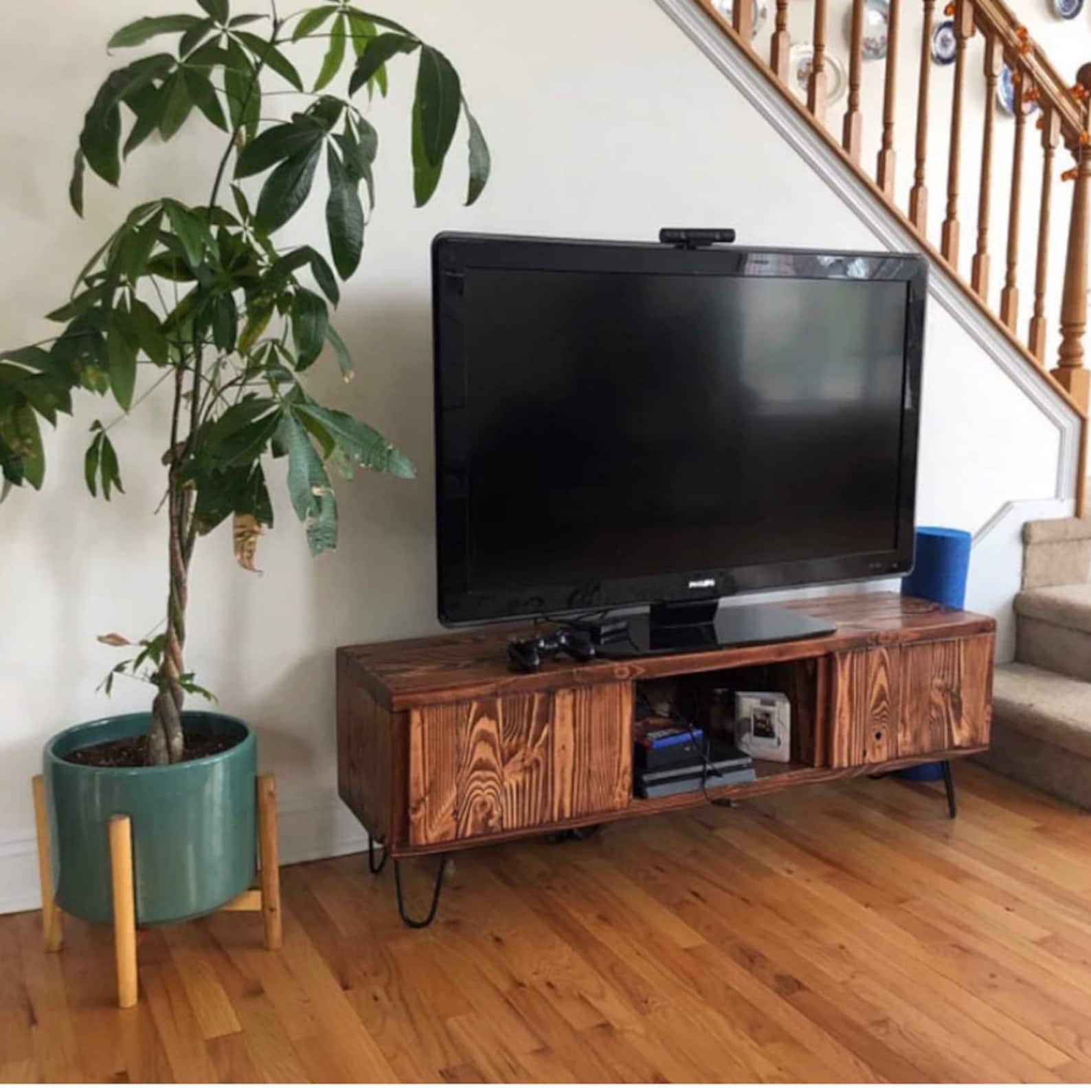 entertainment center, media console, tv stand, living room furniture with 55" tv on top